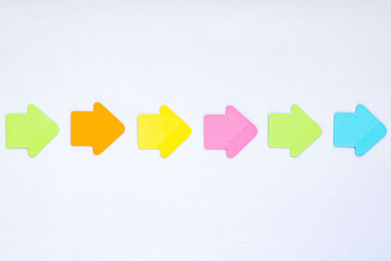 colorful post it arrows in the form of workflow or process, template with white background, six steps