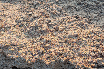 closeup of sand pattern of a beach in the summer