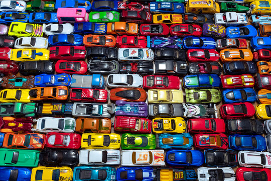 Lots of Hot Wheels toy cars. Top view of a huge collection of Hot Wheels
