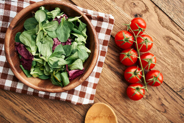 salad plate vegetables fresh ingredients wooden table kitchen