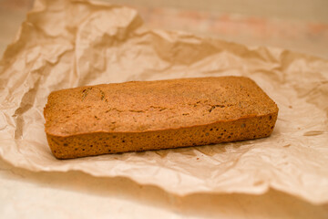 Homemade bread on a vintage background.Do it yourself. Their buckwheat flour bread. Buckwheat bread. Golden baked crust.