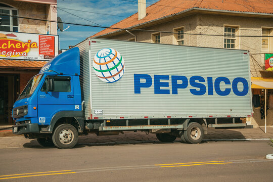 Cambara do Sul, Brazil, July 19, 2019. Pepsico brand painted on the side of a box truck in a stone street of Cambara do Sul. A town with amazing natural tourist attractions.