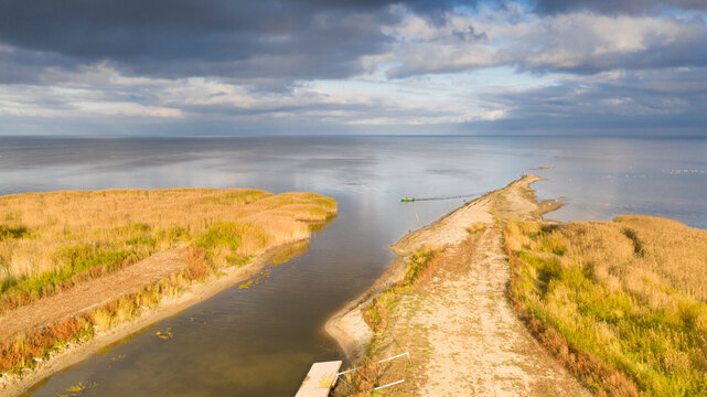 Aerial view to the autumn colored  shallow and sandy  coastal zone of the Lake Peipsi, in Varnja, Estonia. It is the 4th largest lake in Europe