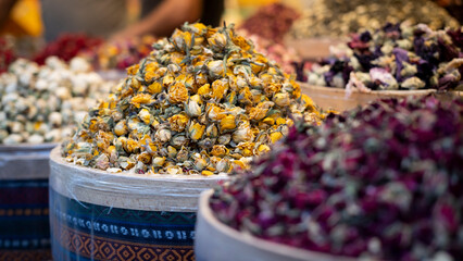 Flower tea rose.Bowls of dry medicinal herbs.Herbal medicine.