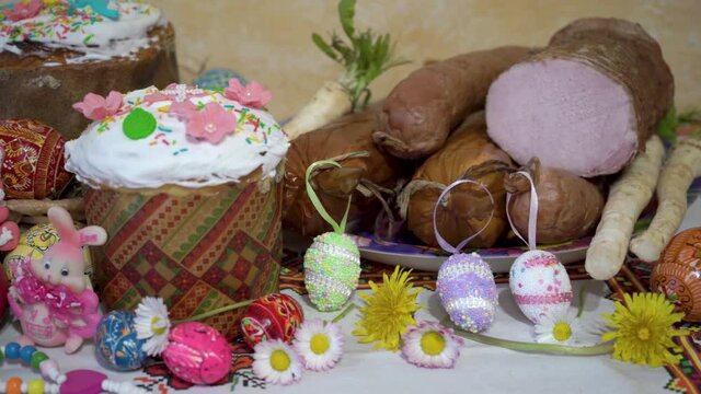 Easter table with sausage,Easter table with ham sausage and Easter eggs