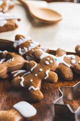Obraz na płótnie Canvas Homemade sweet christmas gingerbread cookies and cookbook.