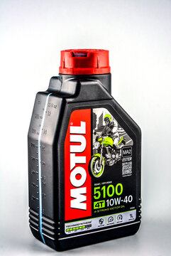 Plastic bottle of motor oil Motul .