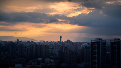 sunset over the city and the Beijing olympic tower