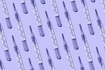 Medical mercury thermometers, pantone 2022 very peri seamless pattern close-up, flat lay. Temperature is 39.9. High quality photo