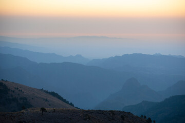 Obraz premium Layer of mountains seen from Pico de Orizaba base camp at sunset