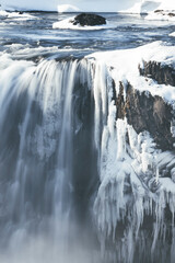 frozen waterfall from aerial view named Godafoss
