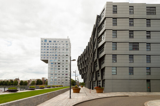Complex The Wave with silver aluminum fronts in the center of Almere city, Flevoland.