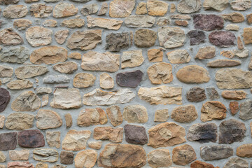 Old rock wall textured background, close up.