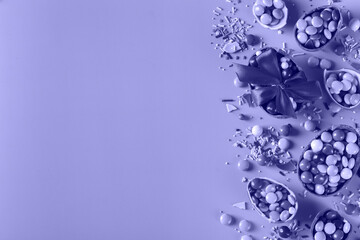 Festive Easter background with chocolate eggs and sweets