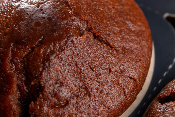 Chocolate muffin close-up. Macro. Brown treat