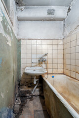 Dirty, ugly, cluttered, messy bathroom in the apartment. Concept: unsanitary conditions, poverty,...