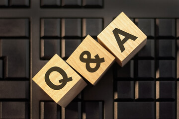 Q and A - Question And Answer - letters on wooden blocks