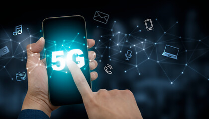 Hand hold mobile phone with technology 5G of mobile telecommunication network in Europe for high speed wireless data connection to internet from smartphones, future technology 5G network.