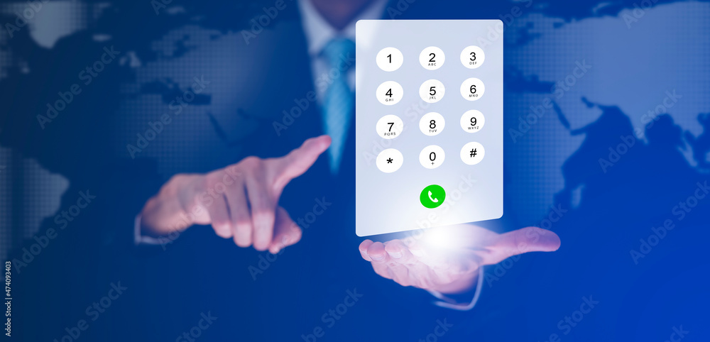 Poster dialing on virtual telephone keypad with transparent telephone buttons, businessman touch button of 