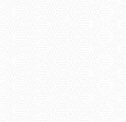 Geometric repeating vector ornament with hexagonal dotted elements. Geometric modern light ornament. Seamless abstract modern dotted pattern