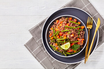 fried brown rice with green beans and carrot