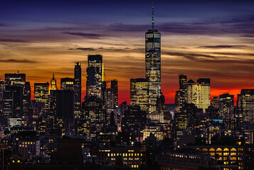 View of Lower Manhattan with Freedom tower at sunset - obrazy, fototapety, plakaty