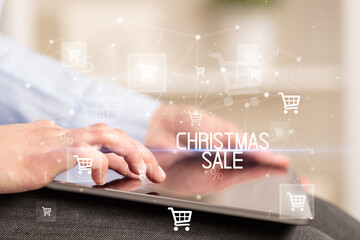 Young person makes a purchase through a tablet