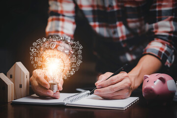 thinking and creative concept, Close up light bulb and working on the desk, Creativity and innovation are keys to success.Concept of new idea and innovation with Brain and light bulbs, working at home