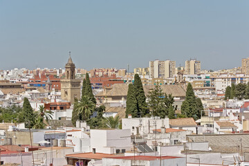 Fototapeta premium Aerial view on downtown seville, Spain, with typical white painted houses and church towers 