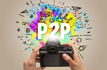 Close-up of a hand holding digital camera with abstract drawing