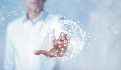 Businessman holding connections system and global data exchange. ,Business network connection concept. hologram screen displaying modern web system Wireless connection futuristic concept