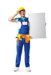 Male builder with blank poster on white background