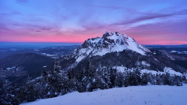 Winter frozen mountain panorama landscape in Slovakia, Red sky before sunrise. 4K