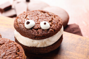 Funny cookie for Halloween on table, closeup