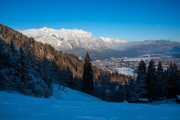 Ski slope over Garmisch partenkirchen with view over town