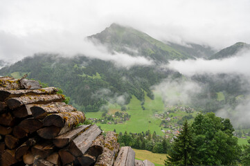 Panoramic view on mountain villages, green forests and apline meadows near Saint-Gervais-les-Bains,...