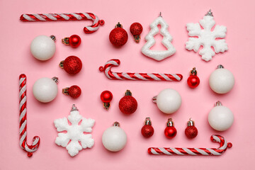 Set of different Christmas decorations on pink background