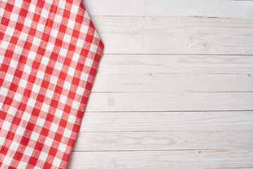 Red checkered tablecloth wooden background texture kitchen decoration