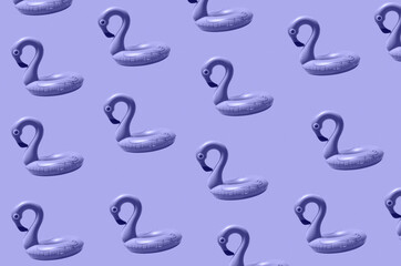 inflatable circle or ring for kids pink flamingo for floating in summer vacation isolated on colored background in 2022 very peri color