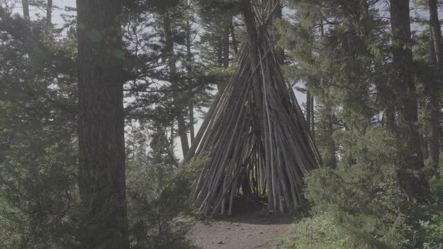 Stick teepee in the mountain forest