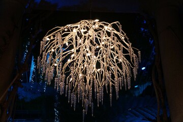 Beautiful bright chandelier made with deer antlers decorated with crystal