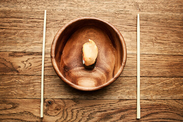 sushi on wooden plates chopsticks Japanese cuisine Asia Fish