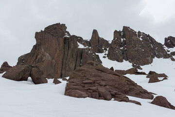 Trekking in winter season. Snowed mountains in La Egorda Valley, Cajón del Maipo, central Andes mountain range, Chile