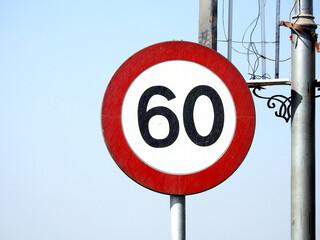 60 KM Speed limit sign a highway, sixty kilometers per hour traffic road sign, a restriction sign...