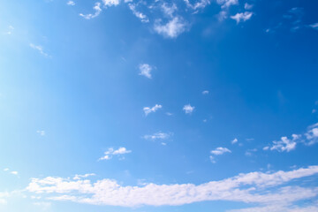 Vast blue clear sky  with white clouds on background