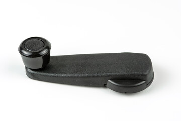 Plastic handle for opening the car window. Spare parts for repair. White background