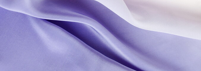 Silk texture Very peri trend color 2022 banner. Fabric background violet color.
