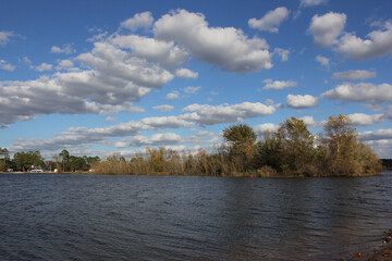 Lake Tyler near Whitehouse TX with Blue Sky and Fluffy Clouds