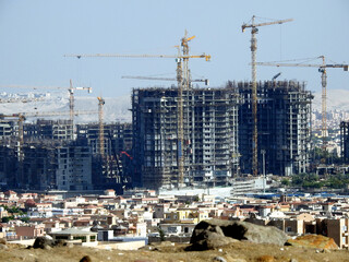 Construction site of new buildings in Egypt of Zed city Sheikh Zayed city, acres of luxurious real...