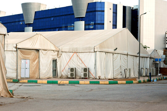 Tents Of A Field Hospital For Covid-19 Coronavirus Cases Isolation, Quarantine And Treatment, Selective Focus Of A Field Hospital For Coronavirus Pandemic Outbreak